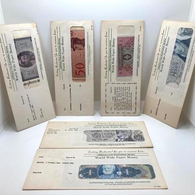 LOT 539: World Wide Paper Money Collection in Original Protective Envelopes