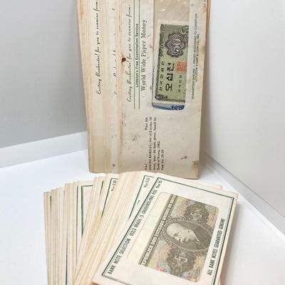 LOT 539: World Wide Paper Money Collection in Original Protective Envelopes