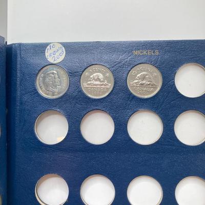 LOT 570: Canadian Coin Collection in Books