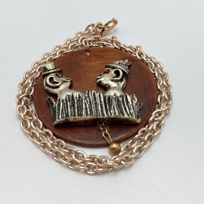 LOT 571: Vintage Jewelry Collection - Lady Nelson Antimagnetic Swiss Made Necklace Watch, Monkey Couple Medallion Necklace and Gold Tone...