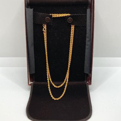 LOT 571: Vintage Jewelry Collection - Lady Nelson Antimagnetic Swiss Made Necklace Watch, Monkey Couple Medallion Necklace and Gold Tone...