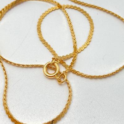 LOT 571: Vintage Jewelry Collection - Lady Nelson Antimagnetic Swiss Made Necklace Watch, Monkey Couple Medallion Necklace and Gold Tone...
