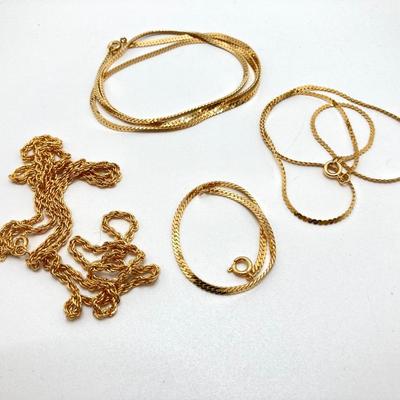 LOT 571: Vintage Jewelry Collection - Lady Nelson Antimagnetic Swiss Made Necklace Watch, Monkey Couple Medallion Necklace and Gold Tone...