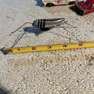 Vintage tin toy cars and bugs
