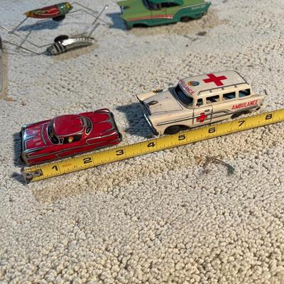 Vintage tin toy cars and bugs