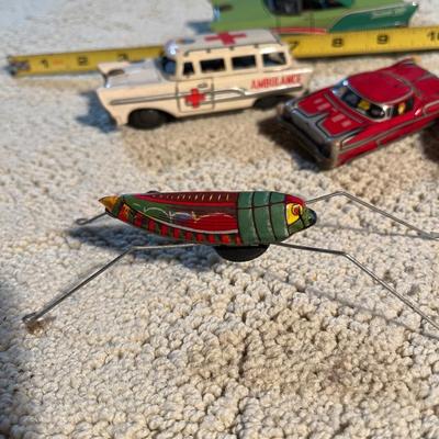 Vintage tin toy cars and bugs