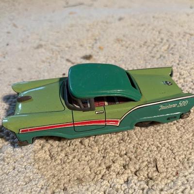 Vintage tin toy cars and bugs