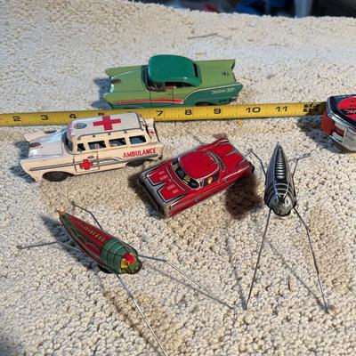 Vintage tin toy cars and bugs