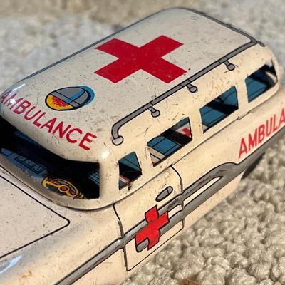 Vintage tin toy cars and bugs