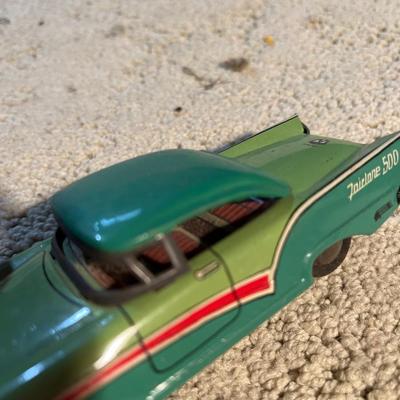 Vintage tin toy cars and bugs