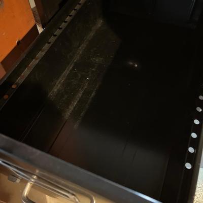 Two 2-drawer metal filing cabinets