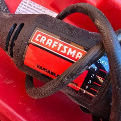 Craftsman variable speed rotary tool with an assortment of bits and molded case