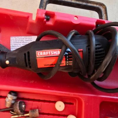 Craftsman variable speed rotary tool with an assortment of bits and molded case