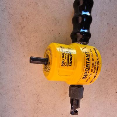 The Rodman Nibbler – Sheet Metal Cutting Tool by Rodman & Company, Inc. with a Gharst & Thomas Pioneer reel tape measure