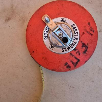 The Rodman Nibbler – Sheet Metal Cutting Tool by Rodman & Company, Inc. with a Gharst & Thomas Pioneer reel tape measure