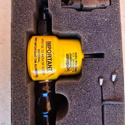 The Rodman Nibbler – Sheet Metal Cutting Tool by Rodman & Company, Inc. with a Gharst & Thomas Pioneer reel tape measure