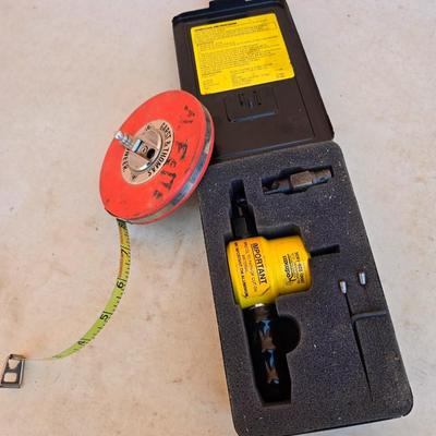 The Rodman Nibbler – Sheet Metal Cutting Tool by Rodman & Company, Inc. with a Gharst & Thomas Pioneer reel tape measure
