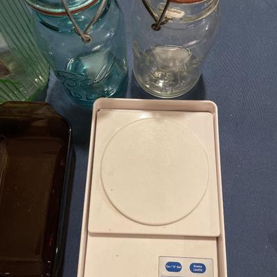 Vintage green jars, scale, measuring and loaf pan