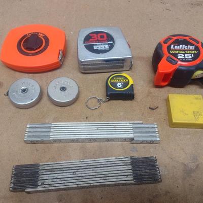 Collection of Measuring Sticks and Tapes