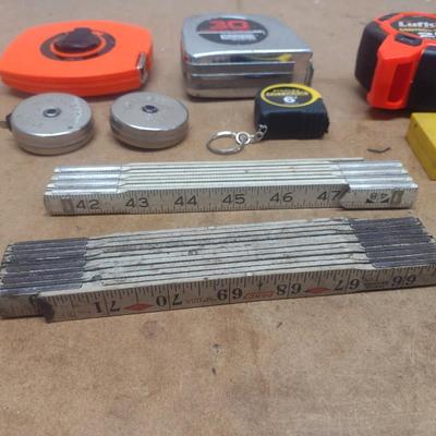 Collection of Measuring Sticks and Tapes
