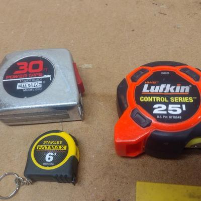 Collection of Measuring Sticks and Tapes
