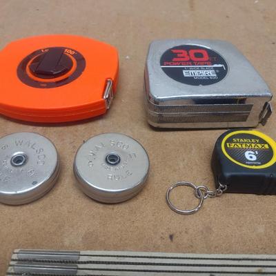 Collection of Measuring Sticks and Tapes