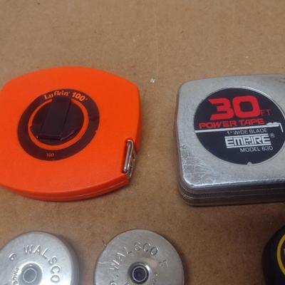 Collection of Measuring Sticks and Tapes