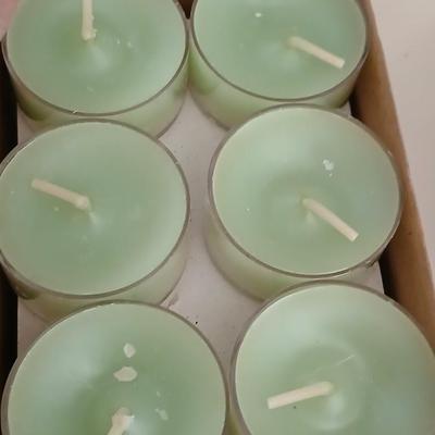 Pair of Black metal Iron Scroll Candelabras with PartyLite Purple Frosted Tulip Glass Shades and boxes of Party Lite candles