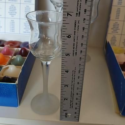 Box of Party lite candles with clear stem glass votives