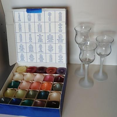 Box of Party lite candles with clear stem glass votives