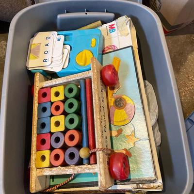 Tote of vintage toys and games