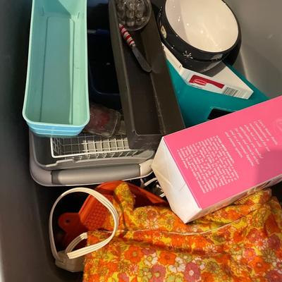 Tote of organizing baskets and vintage heating pad