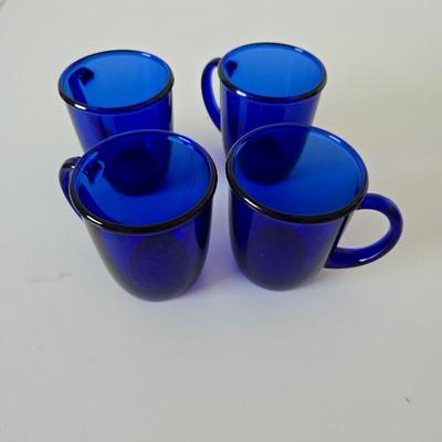 Beautiful, retired Princess House Heritage sapphire pitcher and mugs with Cobalt Blue Glass Bowl