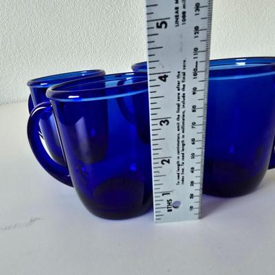 Beautiful, retired Princess House Heritage sapphire pitcher and mugs with Cobalt Blue Glass Bowl