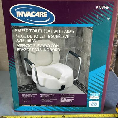 New in Box Raised Toilet Seat