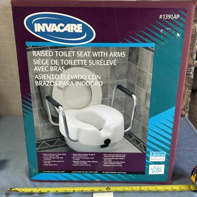 New in Box Raised Toilet Seat