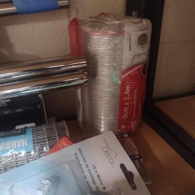 Variety of Household Items including Towel Racks and Shelving