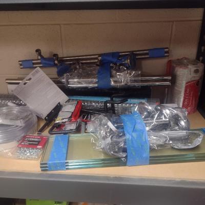 Variety of Household Items including Towel Racks and Shelving