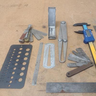 Assortment of Metal Measuring Sticks and Gauges