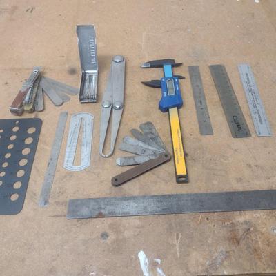 Assortment of Metal Measuring Sticks and Gauges