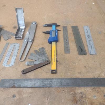Assortment of Metal Measuring Sticks and Gauges