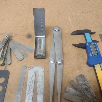 Assortment of Metal Measuring Sticks and Gauges