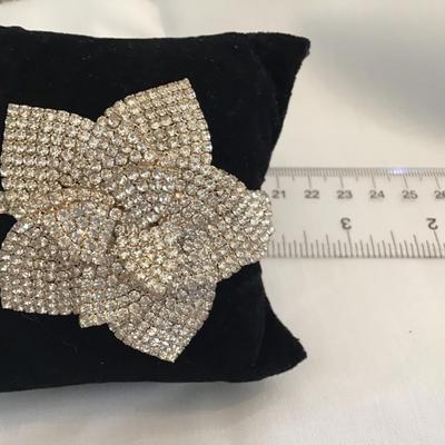 Natasha Couture Rose Rhinestone Clamper Bracelet. Gold Tone