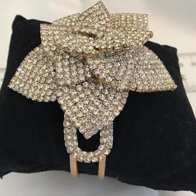 Natasha Couture Rose Rhinestone Clamper Bracelet. Gold Tone