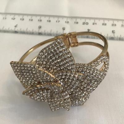 Natasha Couture Rose Rhinestone Clamper Bracelet. Gold Tone