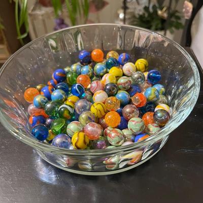 Glass bowl full of marbles