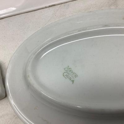 Sale Photo Thumbnail #14: This is a great lot pottery and glass.  You get a nice black and white and orange ashtray, a fish bowl building, restaurant ware oval plate and an Avon milk glass oval soap dish.