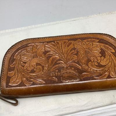 Sale Photo Thumbnail #21: This is a great leather clutch purse.  It is in great condition, with pockets inside.  It zippers close.  Very nice.