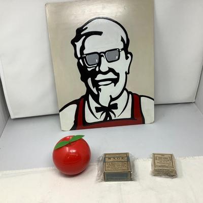 Sale Photo Thumbnail #23: You get this great kitchen lot.  A nice artist numbered and signed KFC Colonel Sanders painted picture, and Apple tray/coasters.  Each one is a different state of an apple being eaten. Also you get two spice cardboard boxes.