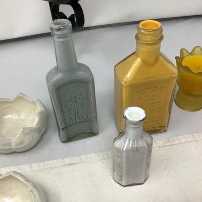 Sale Photo Thumbnail #63: You get a cast iron candle holder, three painted bottles, two flower open dishes, two candles.